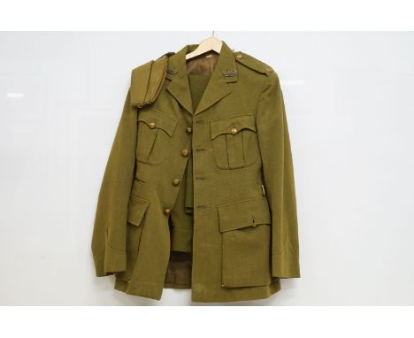 British Army uniform jacket, trousers, No.2 dress, badge for the Gloucestershire regiment complete with side cap with white m