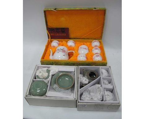 Oriental Late XX Century Jingdezhen Art Ceramic Works, eight-piece tea service in box, two celadon type sets in boxes (3).