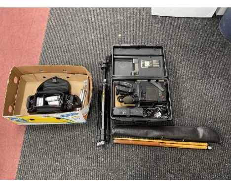Panasonic M7 VH Movie System, in case. Sony Handycam, two tripods, Winmau snooker cue.