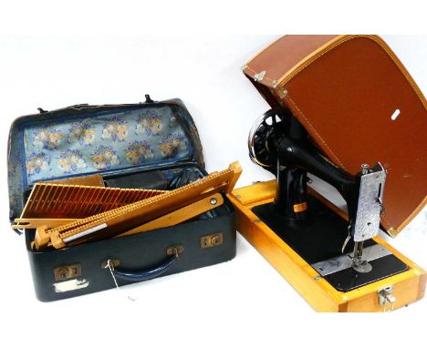 Three Cameras, weaving loom, etc, in case, singer sewing machine.