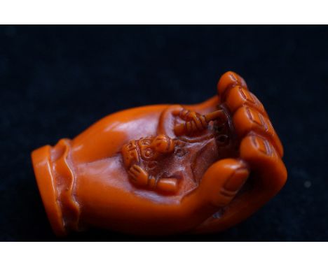 Japanese coral hand netsuke 