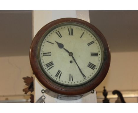 A Victorian circular wall clock with 25cm dial and Roman numerals