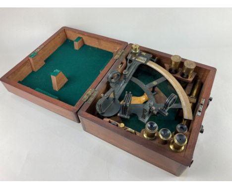 An early 20th century sextant, in fitted mahogany case with brass lenses and sand timers, brass plaque on case presented 'Hug