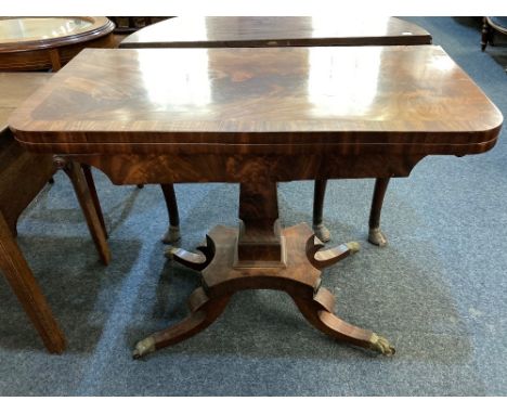 A Victorian mahogany card table crossbanded rounded rectangular foldover top with green baise lining and boxed interior on ba