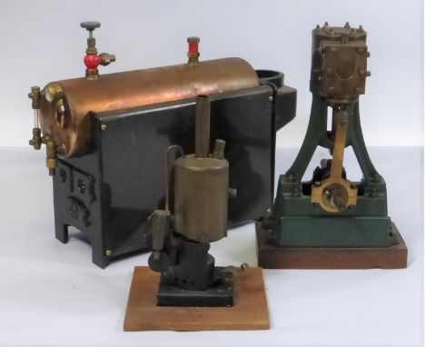 TWO STUART TURNER LTD MODELS. A vertical engine, missing its flywheel, together with a seemingly scratch-built vertical steam