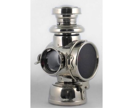 A POWELL &amp; HANMER OIL-POWERED REAR LAMP.  A model 535 with two clear side glasses for illuminating the rear of a vehicle,