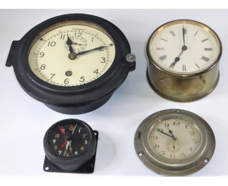 A VETERAN PERIOD DASHBOARD CLOCK having a nickel-plated case, rim-wound with a hand-control button on the left. Also, an Air 