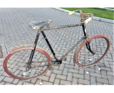 A FABRIQUE NATIONALE DE HERSTAL 'SHAFT DRIVE' GENTLEMAN'S BICYCLE.  With a 26-inch frame, 28-inch wheels, 16-inch curved-flat