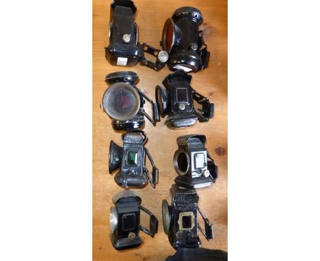 EIGHT OIL-POWERED BICYCLE LAMPS,  to include a rare Lucas Black Prince, front and rear lamps. (8) 