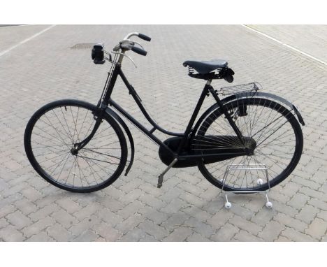 A RUDGE-WHITWORTH LADY'S BICYCLE,  having a 21-inch black loop frame with 28-inch wheels, rear rack, correct two-speed rear h