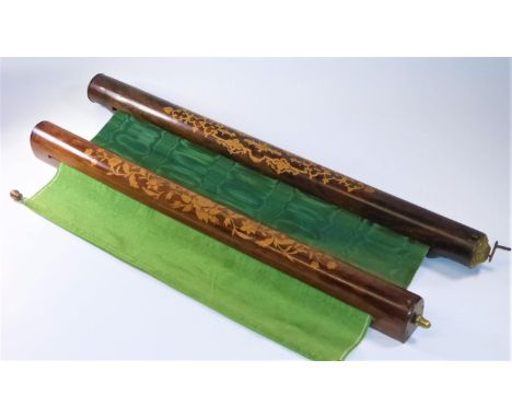 TWO DECORATIVE ROLLER BLINDS.  Although not a pair, both wooden-cased blinds with decorative inlay on rosewood (?) cylinders,