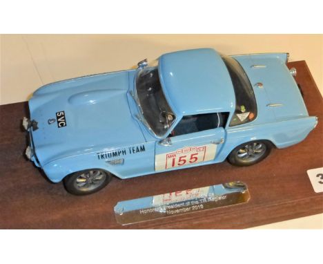 THE 1962 TRIUMPH TR4 RALLY CAR. A quality and well-detailed model of 5 VC, mounted on a plinth and given to Graham Robson 'in