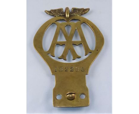 AN AUTOMOBILE ASSOCIATION BADGE.  A large brass badge numbered 132206, 16.5-cms. 