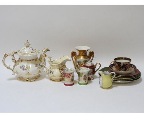 A 19th century Continental porcelain cream jug, with figural reserve, together with a collection of cabinet cups and saucers,