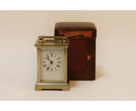 A Continental brass carriage clock, in a fitted case