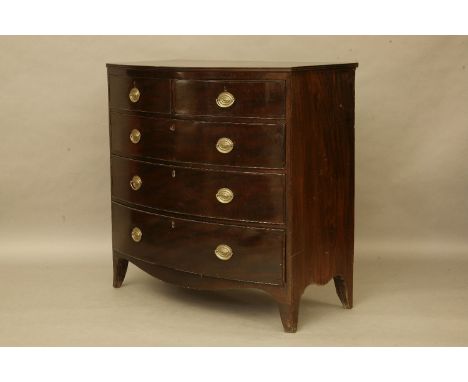 A 19th century bow front chest of two short and three long drawers, outswept bracket feet, 110cm wide