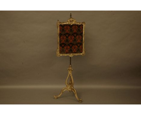 A Victorian gilt pole firescreen with tapestry panel on tripod base, 161cm high