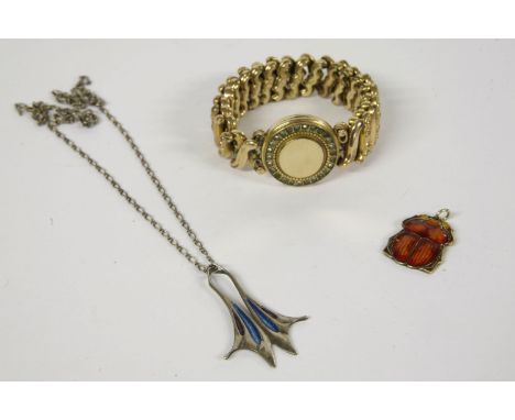 A collection of jewellery to include a Norwegian sterling silver enamel pendant of a scarab beetle, possibly by Hroar Prydz, 