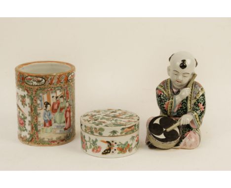 A late 19th century Cantonese brush pot, with alternating figure and exotic bird motifs, a similar jar and cover, and a figur