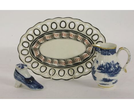 A Caughley jug, a novelty shoe shaped pot, damaged/cracked, and a Wedgwood oval dish