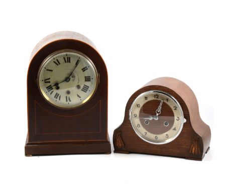 Edwardian mahogany mantel clock, silvered dial, movement striking on five gongs; and an oak mantel clock.
