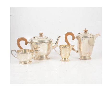 Silver four piece teaset, by G Bryan &amp; Co, Birmingham 1940, the teapo and hot water jug with composition handle and finia