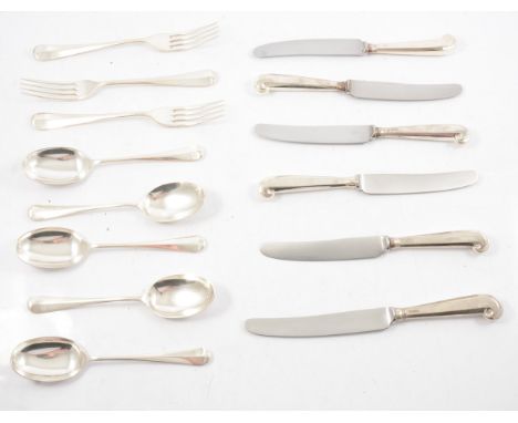 A canteen of silver cutlery, G&amp;H, London 1978, Hanoverian pattern with rat tail bowls, including eight table spoons, eigh