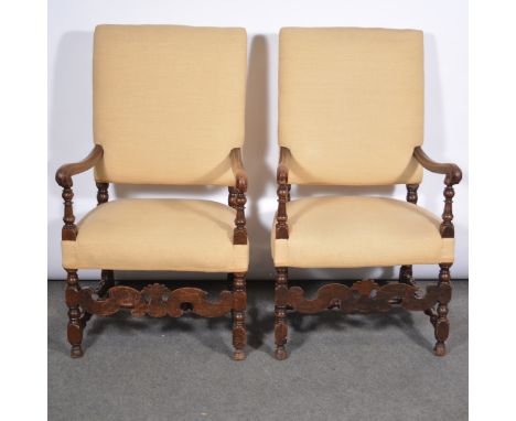 Pair of walnut elbow chairs, fawn coloured upholstery, baluster and bobbin turned uprights, scrolled front rails, width 61cm,