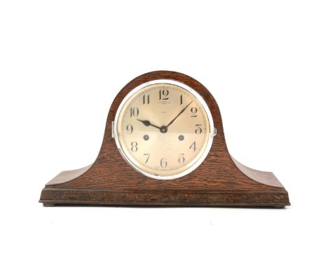 James Walker oak cased Napoleon style twin train mantel clock, Enfield movement, height 23cm.