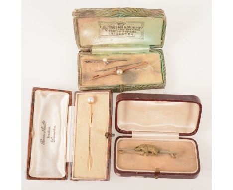 A 7.3mm cultured pearl stick pin peg set on a yellow metal pin, Pearce &amp; Sons Ltd of Leicester vintage box, a 65mm yellow