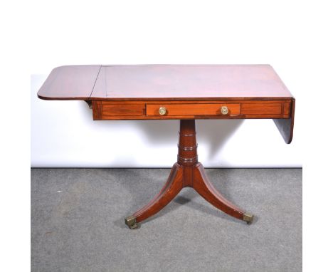 Regency mahogany sofa table, rectangular top with ebony stringing, two drop leaves (one a.f.), frieze drawer, turned and ring