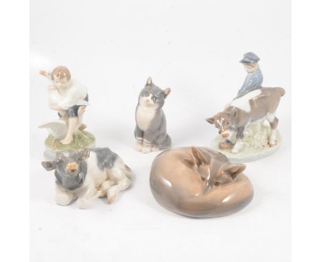 Royal Copenhagen, model of a Farm Boy and Calf, 16cm; other models including; calf, cat, curled fox, boy and ducks.