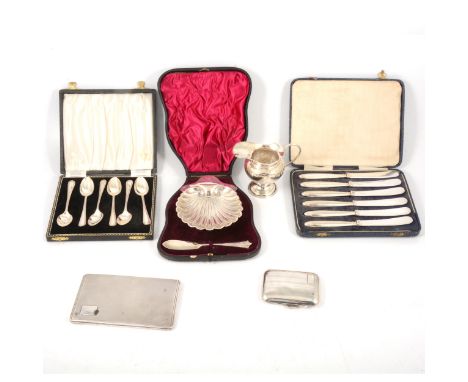 A silver butter shell dish, Josiah Williams &amp; Co (George Maudsley Jackson), London 1895, with matched knife, cased; a sil