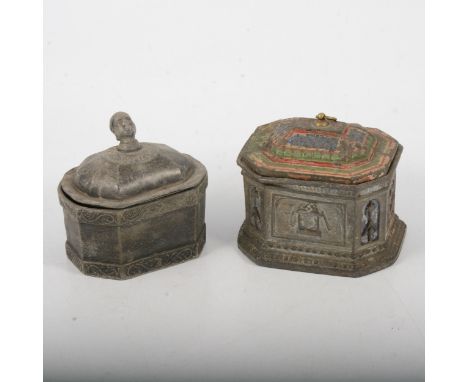 An early 19th century lead tobacco box with cover and tamper, canted rectangular form, cover with finial modelled as a head, 
