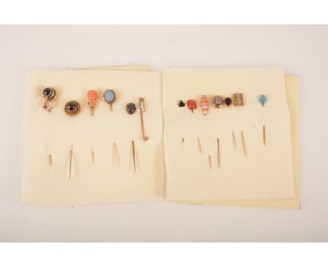 Twelve stick pins and a bar brooch, a Victorian garnet carbuncle pin with Etruscan style border, 15mm, a pear shaped coral en