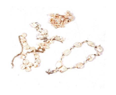 Gemporia - A baroque cultured pearl and silver necklace and bracelet set, total thirty-nine pearls ; a baroque cultured pearl