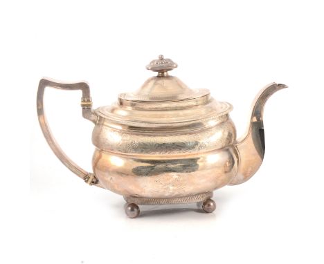 A George III silver teapot, Robertson &amp; Walton, Newcastle 1811, shaped oval form, engraved decoration, 23oz, 20cm.