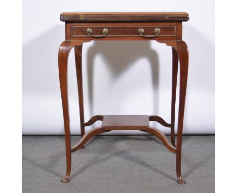 Edwardian mahogany envelope-top card table, the folding top enclosing a baize playing surface, frieze drawer, cabriole legs j