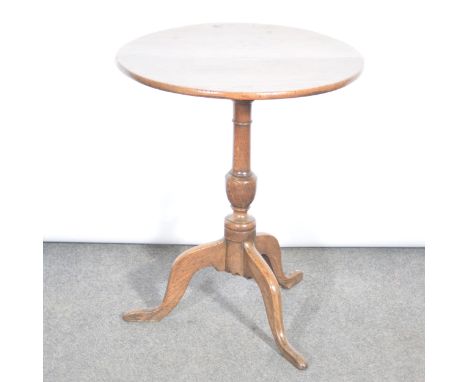 George III oak tripod table, circular fixed top diameter 55cm, turned column, splayed legs, height 69cm.