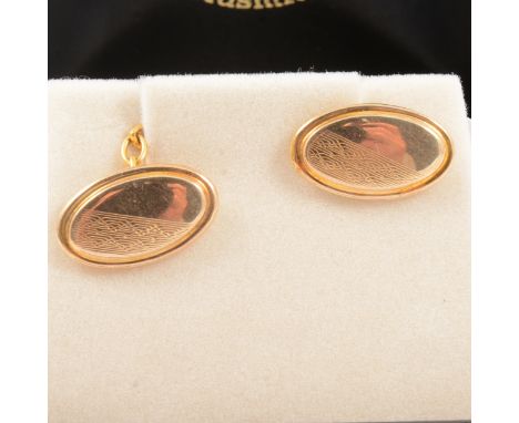 A pair of 9 carat yellow gold chain link cufflinks, diagonal engine turned design to one side of each face, no personal engra