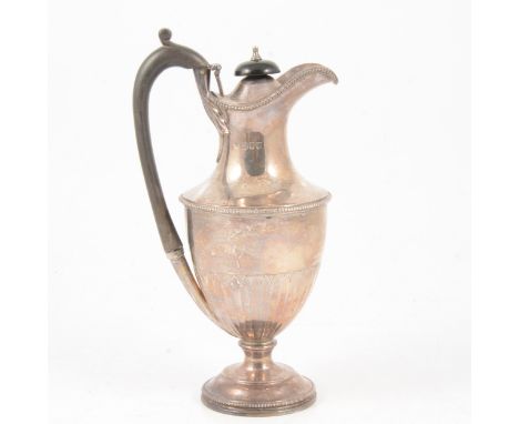 A George III style silver ewer, Walter &amp; John Barnard, London 1895, ebonised handle and finial, 22.5cm, approx. 11oz gros