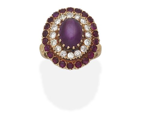 STAR RUBY AND DIAMOND CLUSTER RINGOval cabochon ruby with single-cut diamonds and circular-cut rubies, ring size approx. MFor