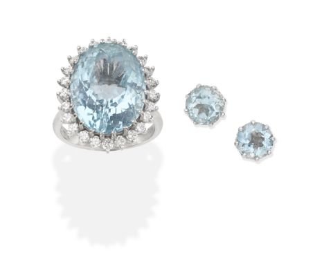 AQUAMARINE AND DIAMOND RING AND EARSTUDS1st: 1974, ring set with an oval-cut aquamarine and brilliant-cut diamonds, mounted i