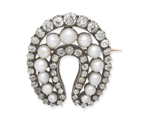 NATURAL PEARL AND DIAMOND HORSESHOE BROOCH, CIRCA 1880Of openwork design, with 3.1-5.3mm pearls and old brilliant-cut and cus