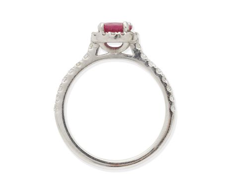 RUBY AND DIAMOND RING, 2014Cushion-shaped ruby and brilliant-cut diamonds, mounted in platinum, London hallmark, ring size ap