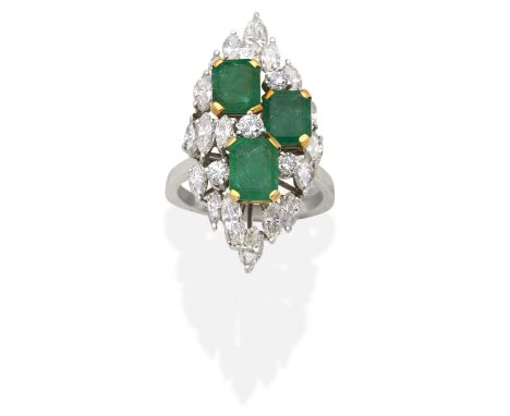 EMERALD AND DIAMOND DRESS RINGMarquise and brilliant-cut diamonds and three step-cut emeralds, diamonds approx. 2.40cts total