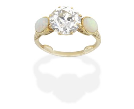 DIAMOND AND OPAL RINGThe old brilliant-cut diamond, weighing 4.12 carats, between opal cabochons, ring size very approx. N (s