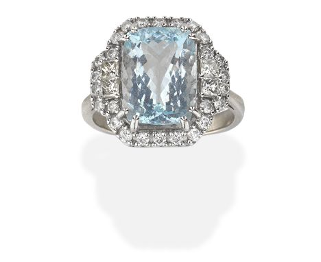 AQUAMARINE AND DIAMOND RINGCushion-shaped aquamarine, weighing 5.30 carats, and brilliant and princess-cut diamonds, diamonds