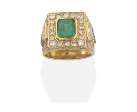 EMERALD AND DIAMOND RINGCentral step-cut emerald and brilliant and shield shaped diamond and emerald shoulders, emerald appro