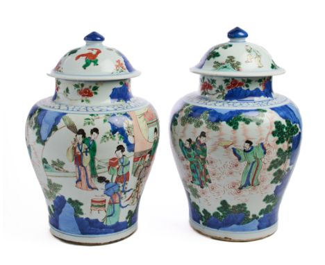 each baluster body rising from a flat base to a short straight neck, painted and enamelled around the exterior with ladies en